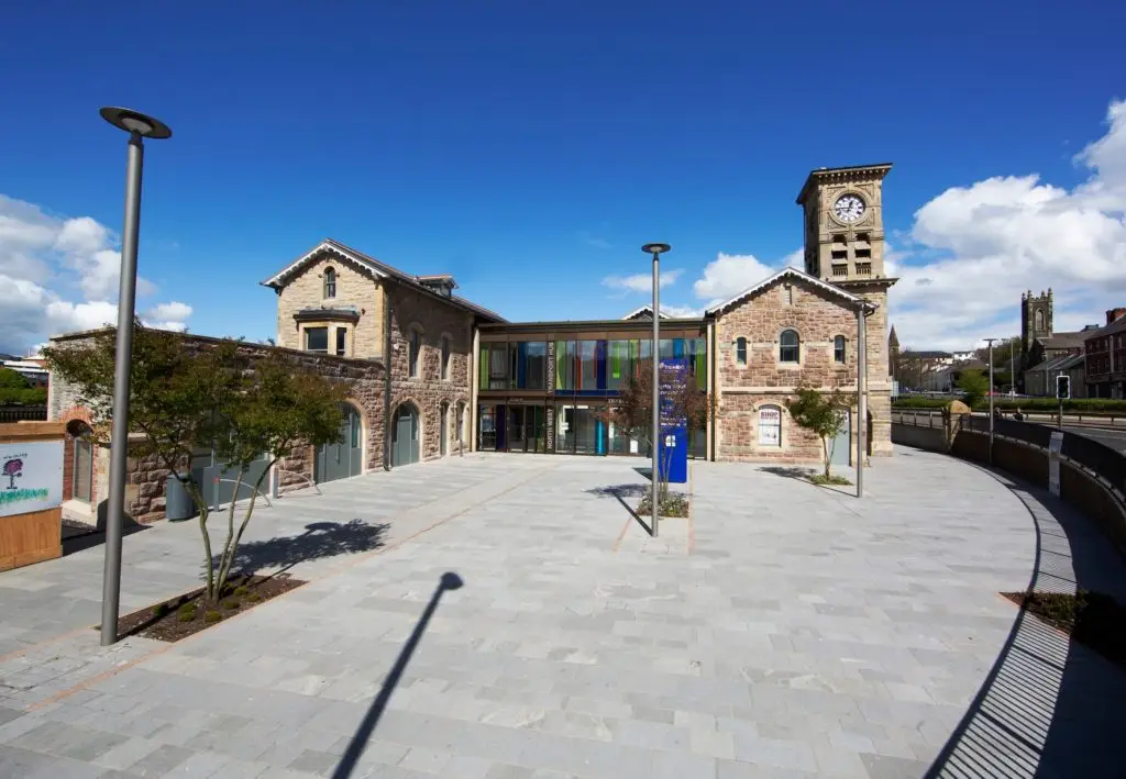 New public realm improving visitor arrival and creating the setting for the restored Derry Station.